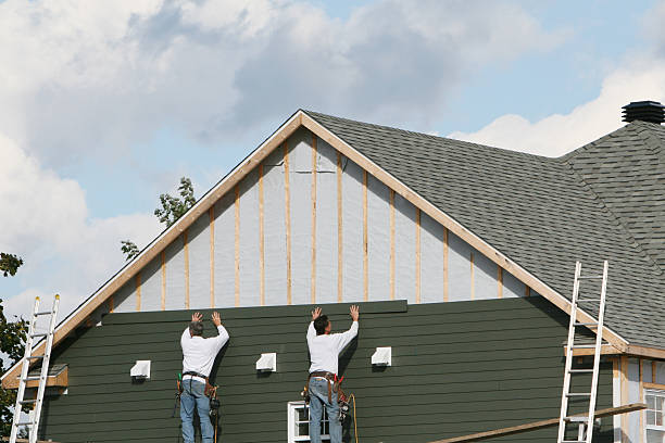 Professional Emergency Siding Repair technician working in Lewisburg, OH